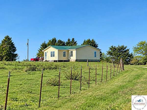 17 Acres of Land with Home for Sale in Cole Camp, Missouri
