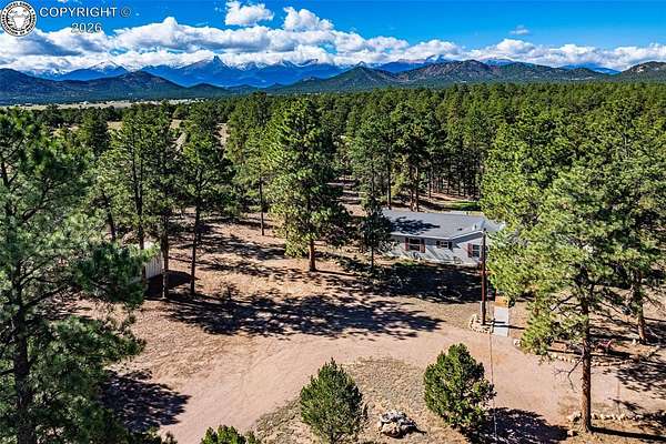 5.14 Acres of Land with Home for Sale in Cotopaxi, Colorado