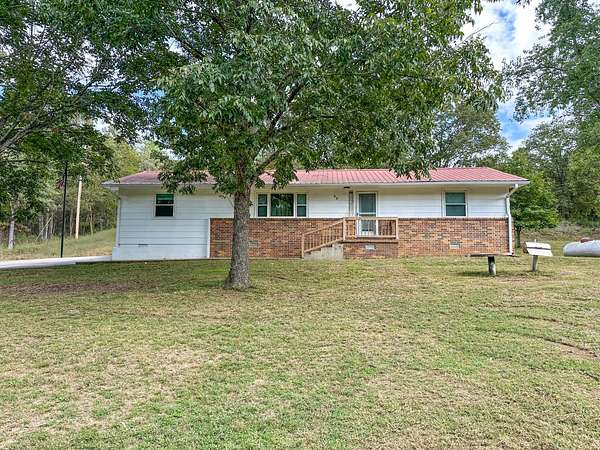 5 Acres of Land with Home for Sale in Evening Shade, Arkansas