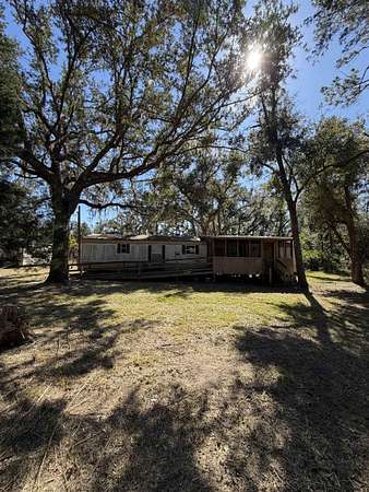 1.89 Acres of Land with Home for Sale in Perry, Florida