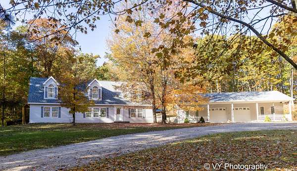 10 Acres of Recreational Land with Home for Sale in Harrisville, Michigan