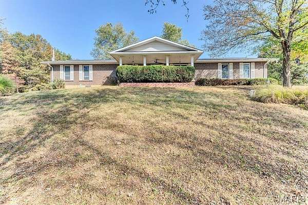 6.1 Acres of Land with Home for Sale in De Soto, Missouri