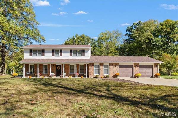 1.59 Acres of Land with Home for Sale in Lake St. Louis, Missouri