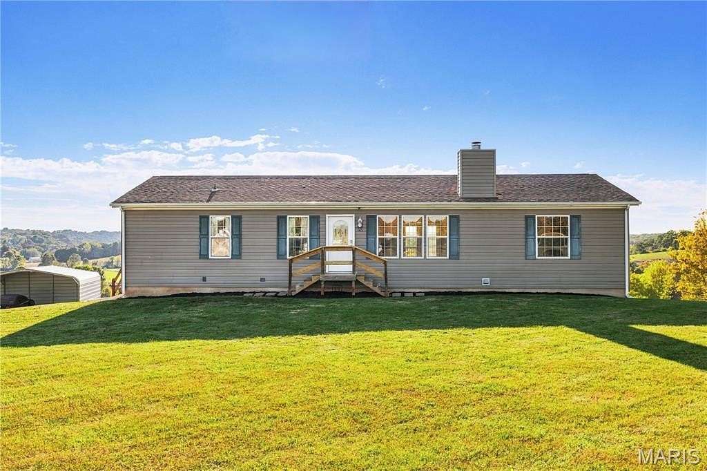 2.55 Acres of Land with Home for Sale in Foley, Missouri