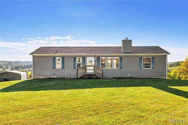 2.55 Acres of Land with Home for Sale in Foley, Missouri