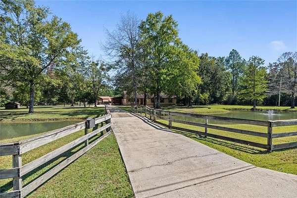 8.32 Acres of Land with Home for Sale in Axis, Alabama