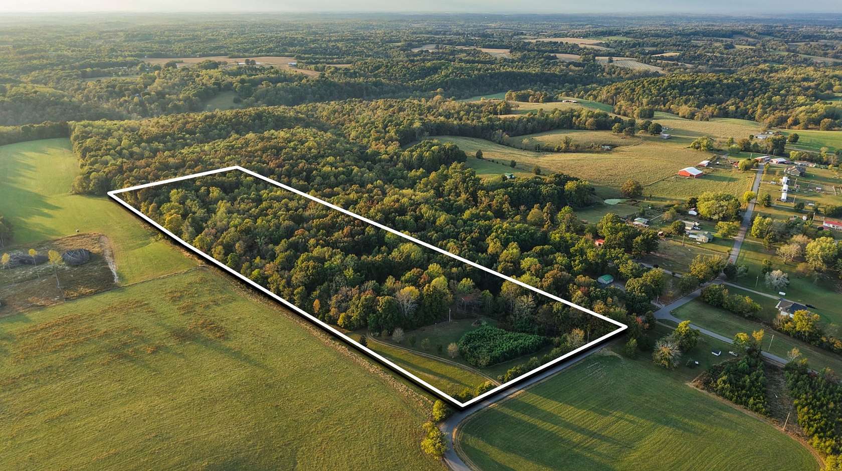 23.8 Acres of Land with Home for Sale in Westmoreland, Tennessee