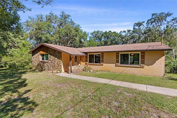 2.16 Acres of Land with Home for Sale in Hudson, Florida