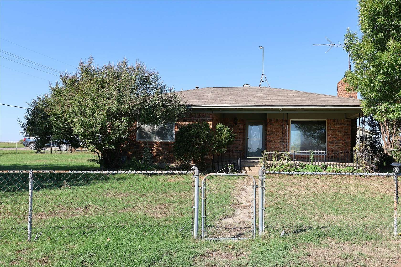 5.55 Acres of Land with Home for Lease in Cross Roads, Texas