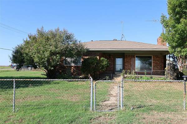 5.55 Acres of Land with Home for Lease in Cross Roads, Texas
