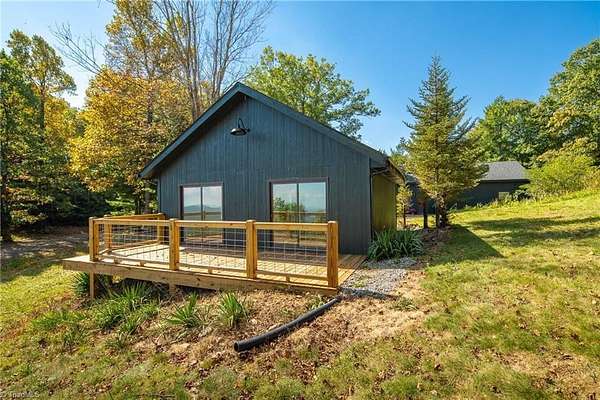 4.4 Acres of Land with Home for Sale in Purlear, North Carolina