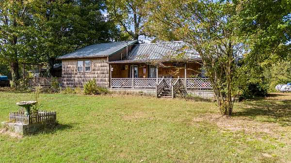 57 Acres of Land with Home for Sale in Albany, Kentucky
