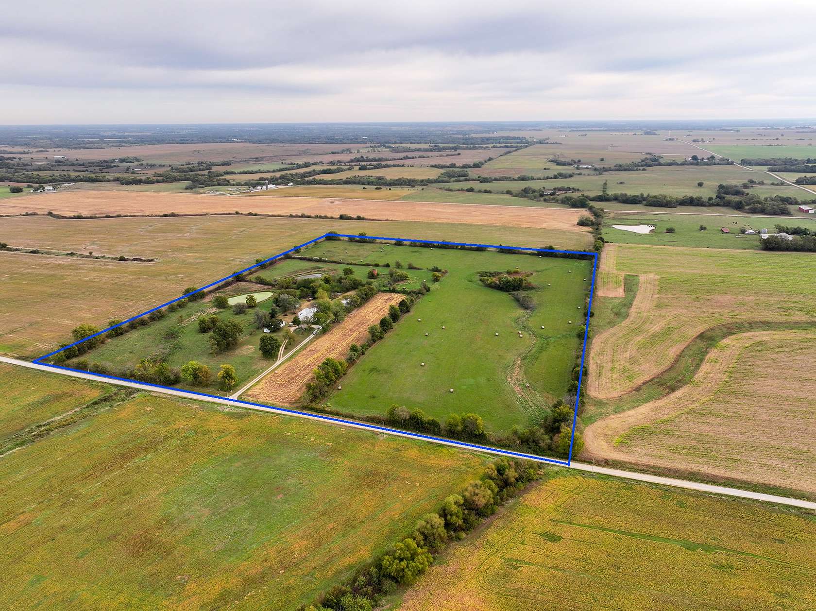 35.1 Acres of Land with Home for Sale in Lamar, Missouri