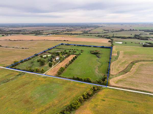 35.1 Acres of Land with Home for Sale in Lamar, Missouri