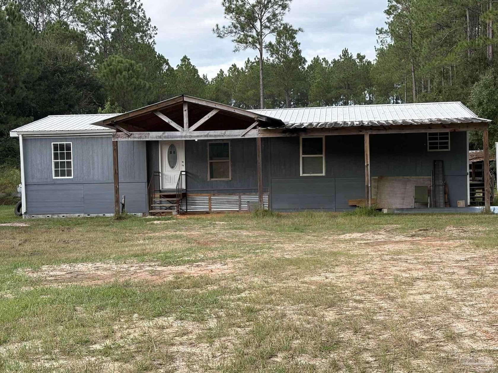 2.5 Acres of Land with Home for Sale in Milton, Florida