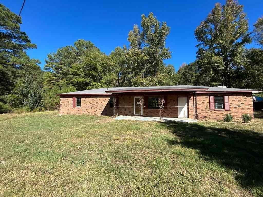6.5 Acres of Land with Home for Sale in Fulton, Mississippi