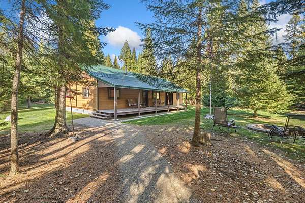 24.6 Acres of Recreational Land with Home for Sale in Metaline Falls, Washington