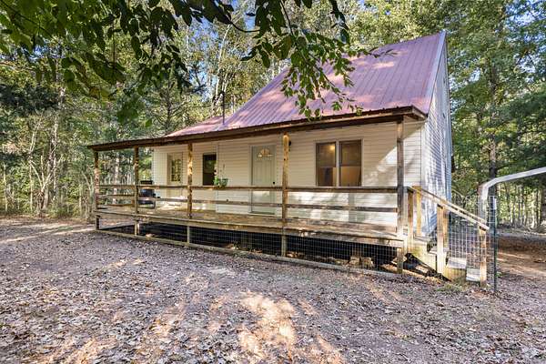 7.5 Acres of Land with Home for Sale in Linden, Tennessee
