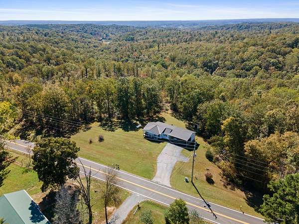 15.5 Acres of Land with Home for Sale in Lyles, Tennessee