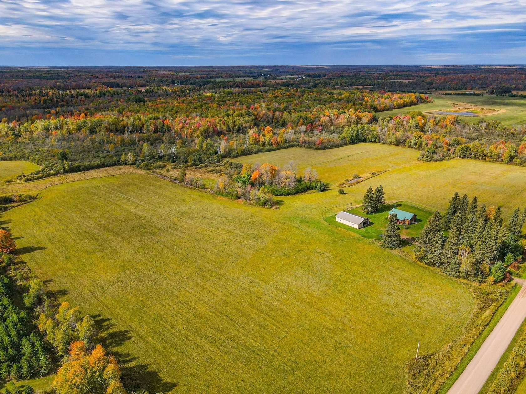 320 Acres of Land with Home for Sale in Hawkins, Wisconsin