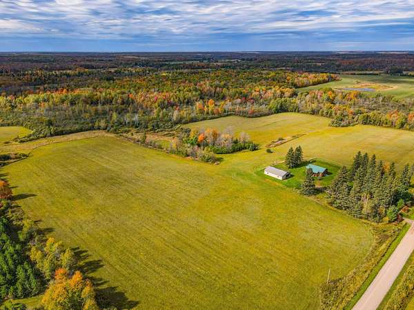 320 Acres of Land with Home for Sale in Hawkins, Wisconsin