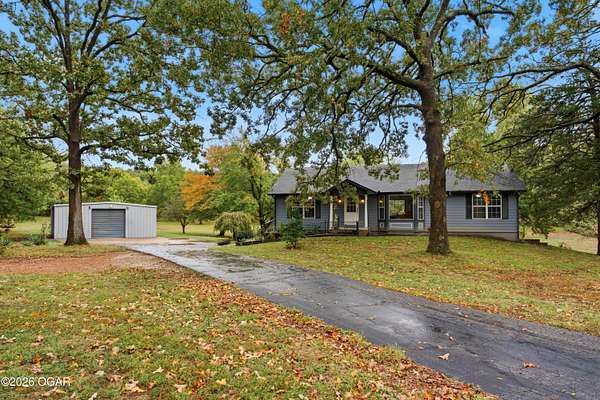 5.4 Acres of Land with Home for Sale in Carthage, Missouri