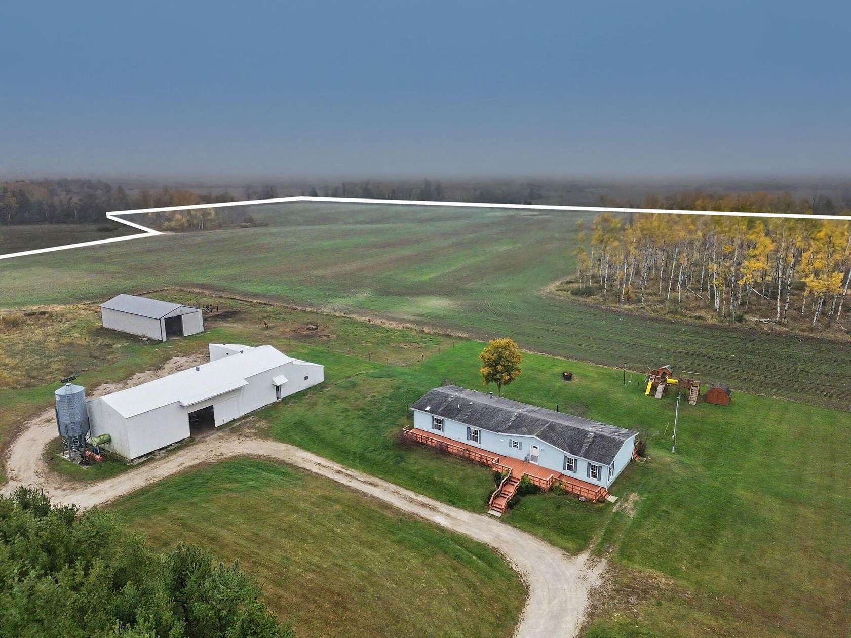 32 Acres of Land with Home for Sale in Onaway, Michigan