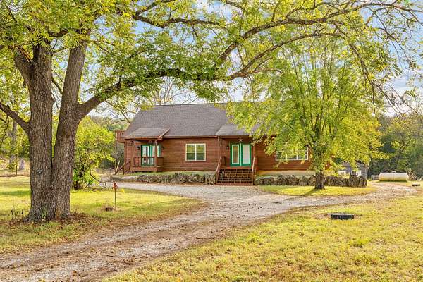 78.6 Acres of Recreational Land with Home for Sale in Kissee Mills, Missouri