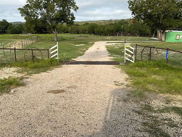 10.6 Acres of Land with Home for Sale in Stonewall, Texas