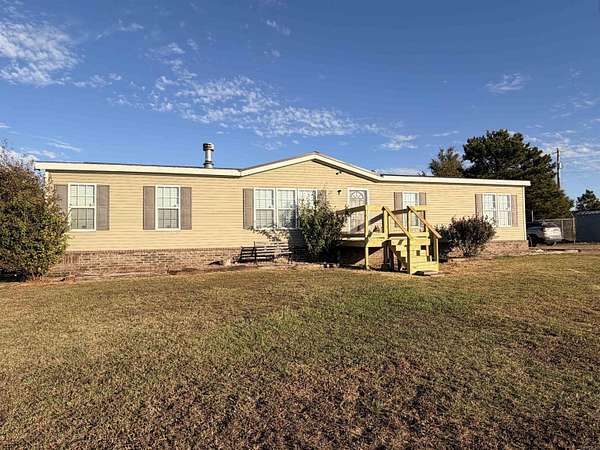 9.42 Acres of Land with Home for Sale in Romance, Arkansas