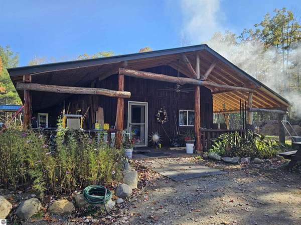 10 Acres of Recreational Land with Home for Sale in Glennie, Michigan