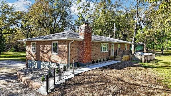 2.22 Acres of Land with Home for Sale in Peculiar, Missouri