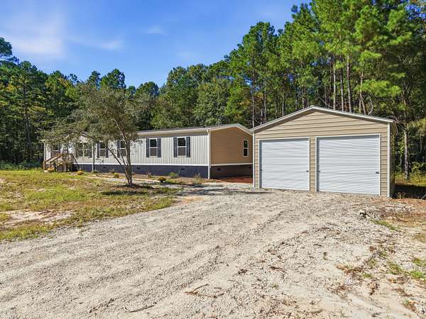1.56 Acres of Land with Home for Sale in Cross, South Carolina