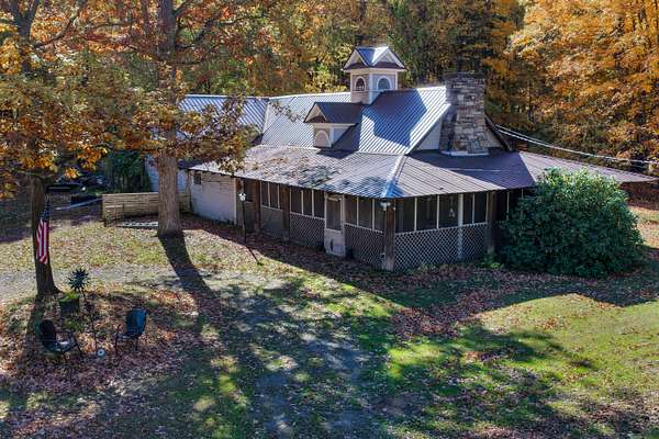 1.67 Acres of Land with Home for Sale in Port Kent, New York