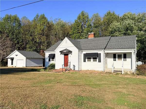 7.3 Acres of Land with Home for Sale in Roaring River, North Carolina