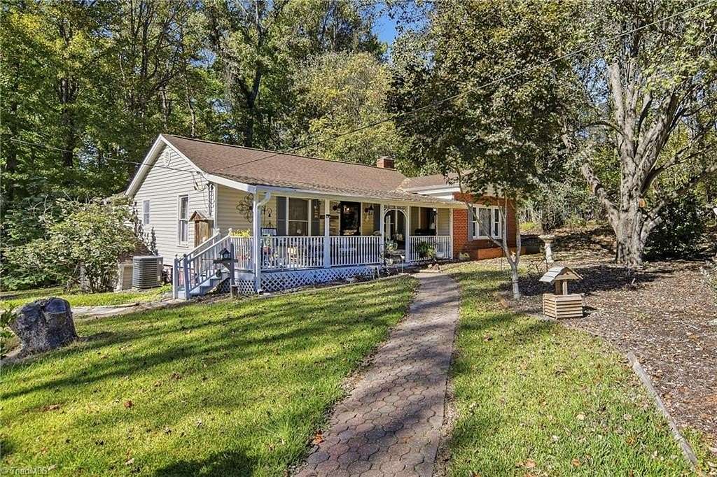 1.5 Acres of Land with Home for Sale in Oak Ridge, North Carolina