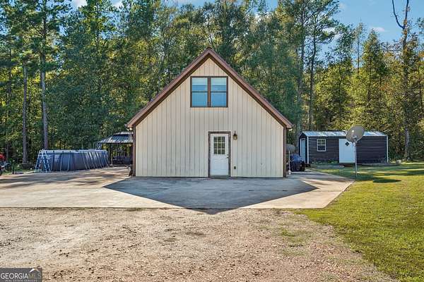 5.6 Acres of Land with Home for Sale in Mansfield, Georgia