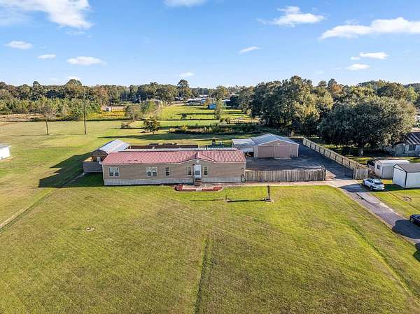 1.64 Acres of Land with Home for Sale in Lake Arthur, Louisiana