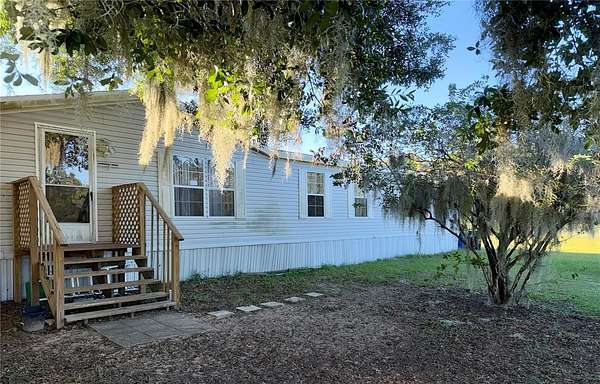 2.13 Acres of Land with Home for Sale in Astatula, Florida