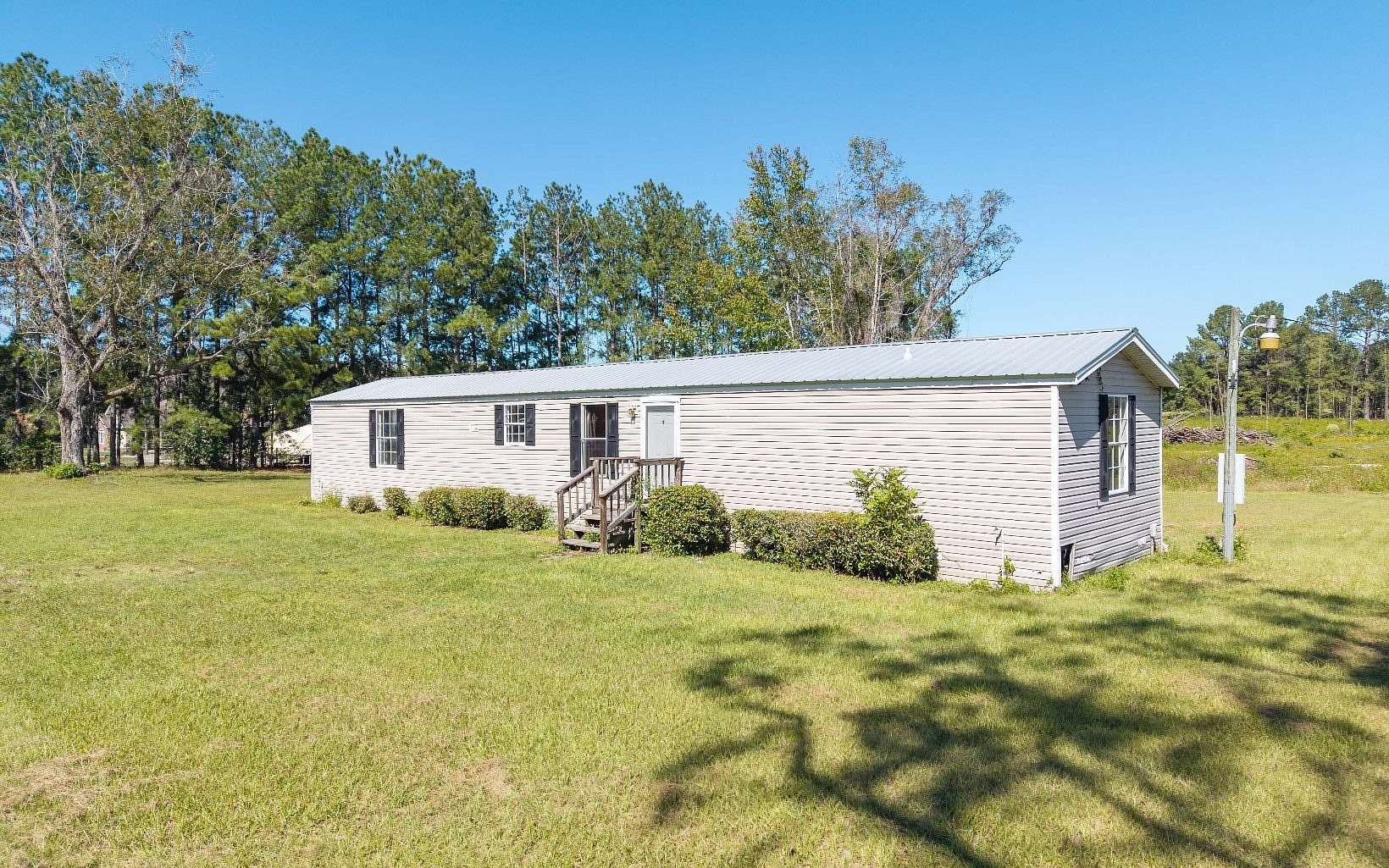 6.5 Acres of Land with Home for Sale in Lake City, Florida