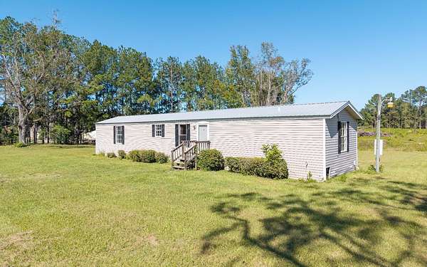 6.5 Acres of Land with Home for Sale in Lake City, Florida