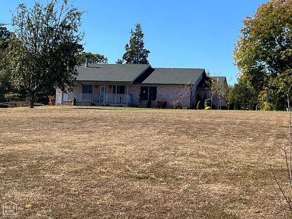 7.7 Acres of Land with Home for Sale in Jonesboro, Arkansas