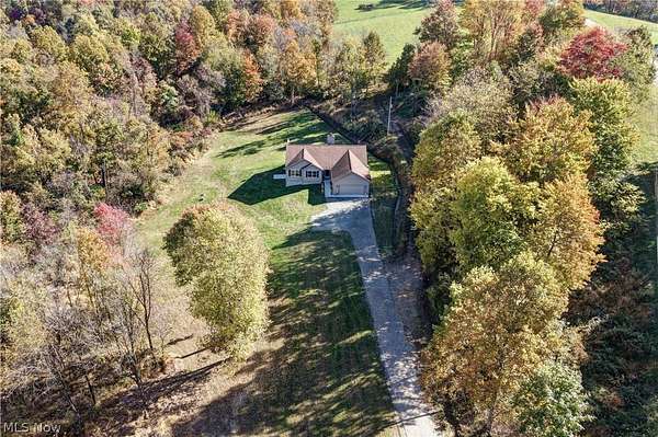 5 Acres of Land with Home for Sale in Stone Creek, Ohio