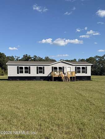 3.25 Acres of Land with Home for Sale in Brooker, Florida