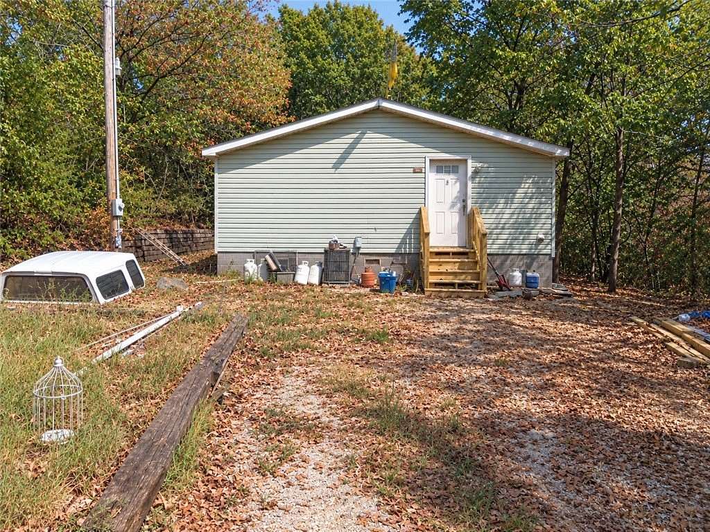 2.75 Acres of Land with Home for Sale in Garfield, Arkansas