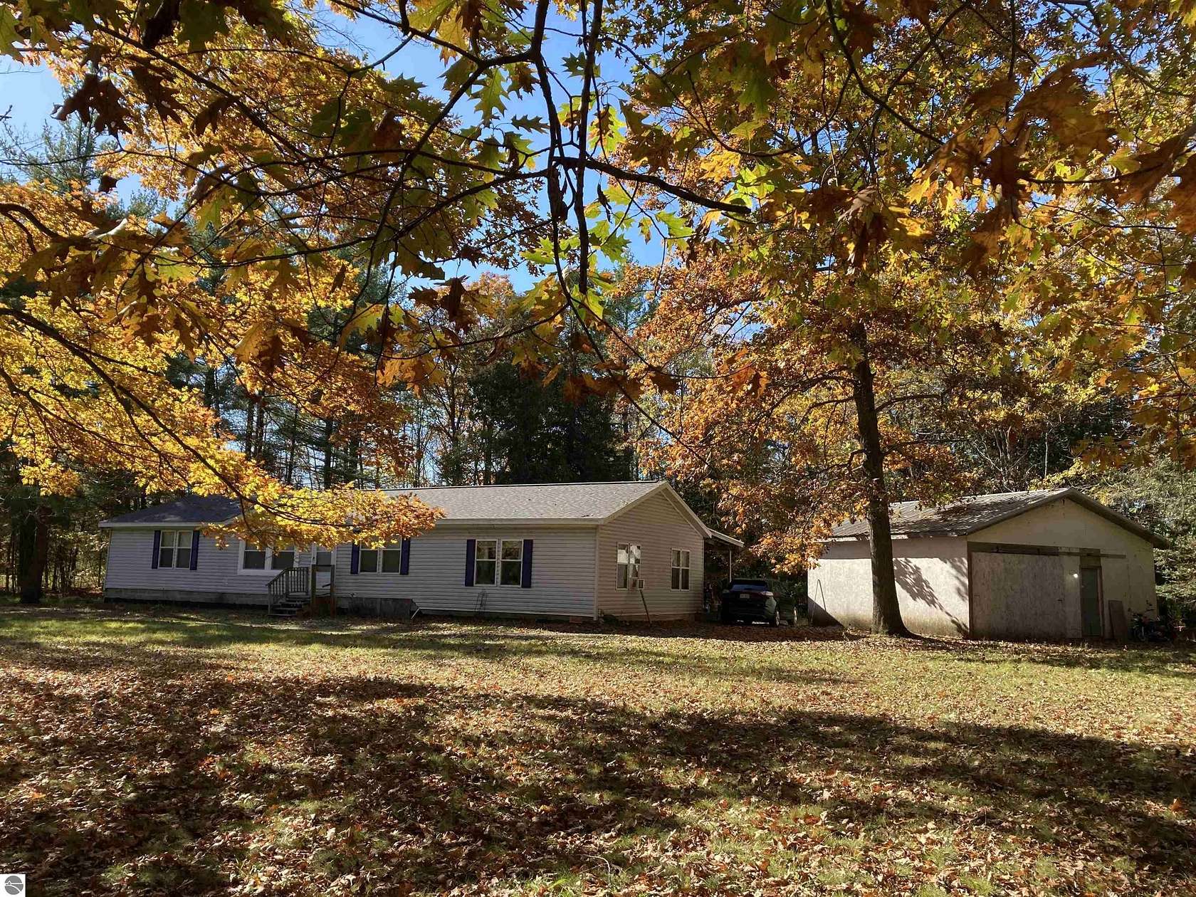 2.45 Acres of Land with Home for Sale in Lupton, Michigan