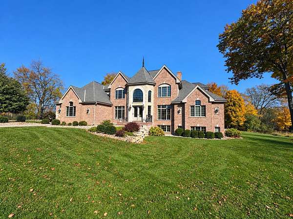 5.76 Acres of Land with Home for Sale in Oconomowoc, Wisconsin