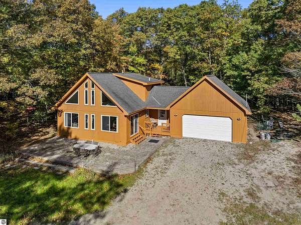 1.5 Acres of Land with Home for Sale in Honor, Michigan
