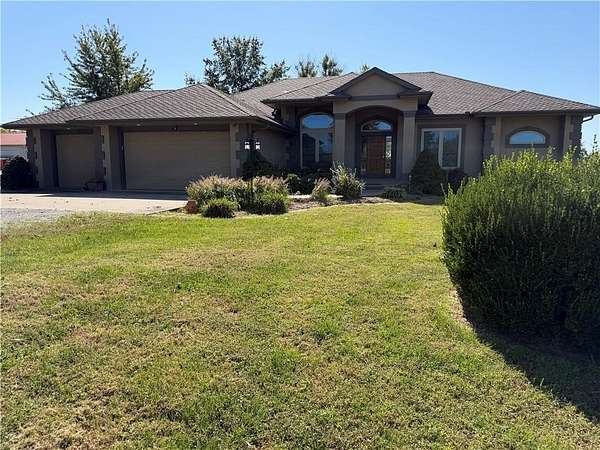 3.3 Acres of Land with Home for Sale in Camden, Missouri