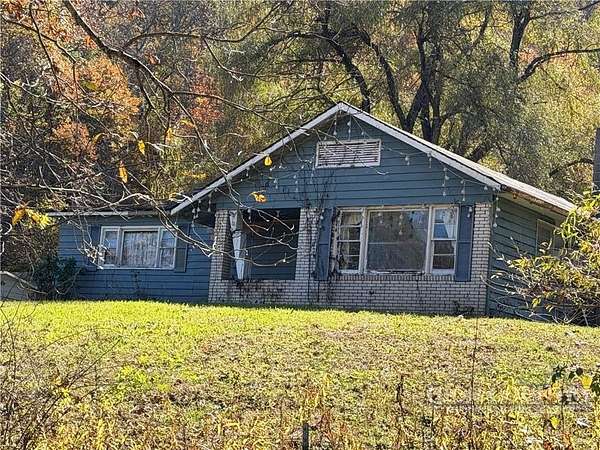 9.55 Acres of Land with Home for Sale in Warrensville, North Carolina